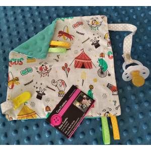 Doudou cirque attache tétine