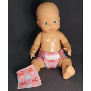 Couche poupée rose champignon