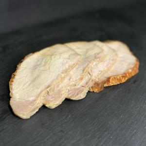 Rôti de porc cuit tranché
